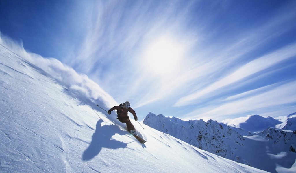 down the slope skiing