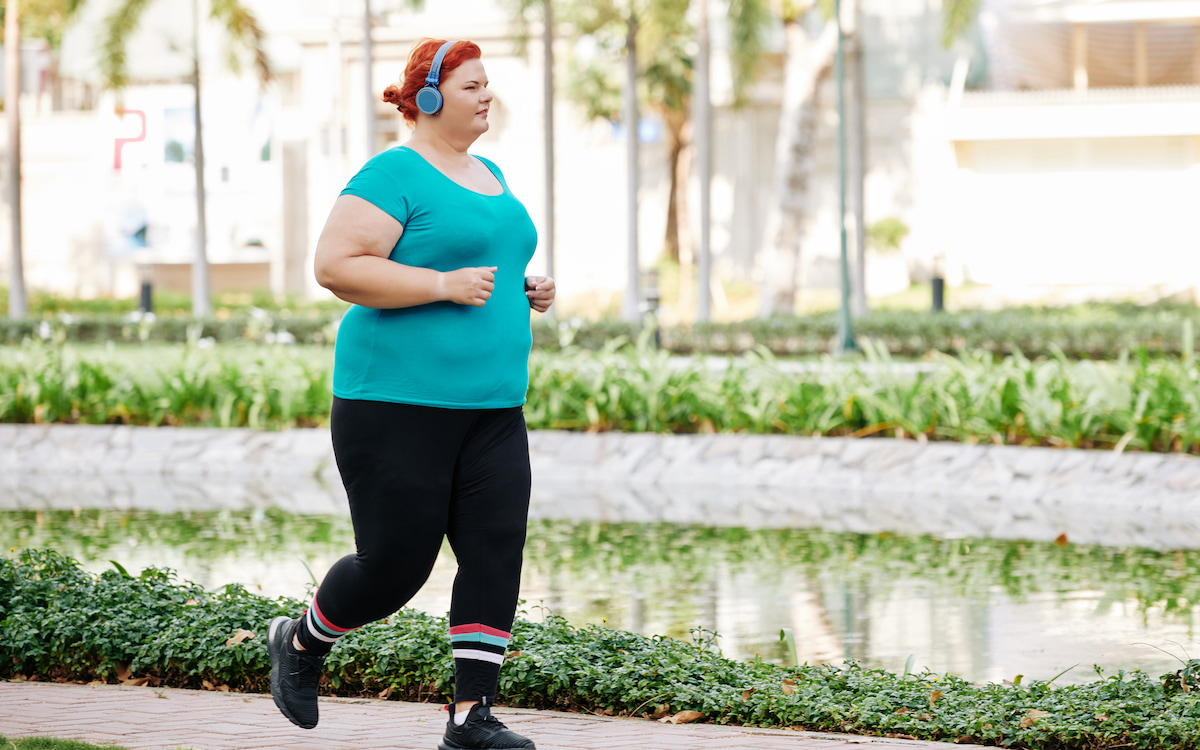 plus size woman taking a jog