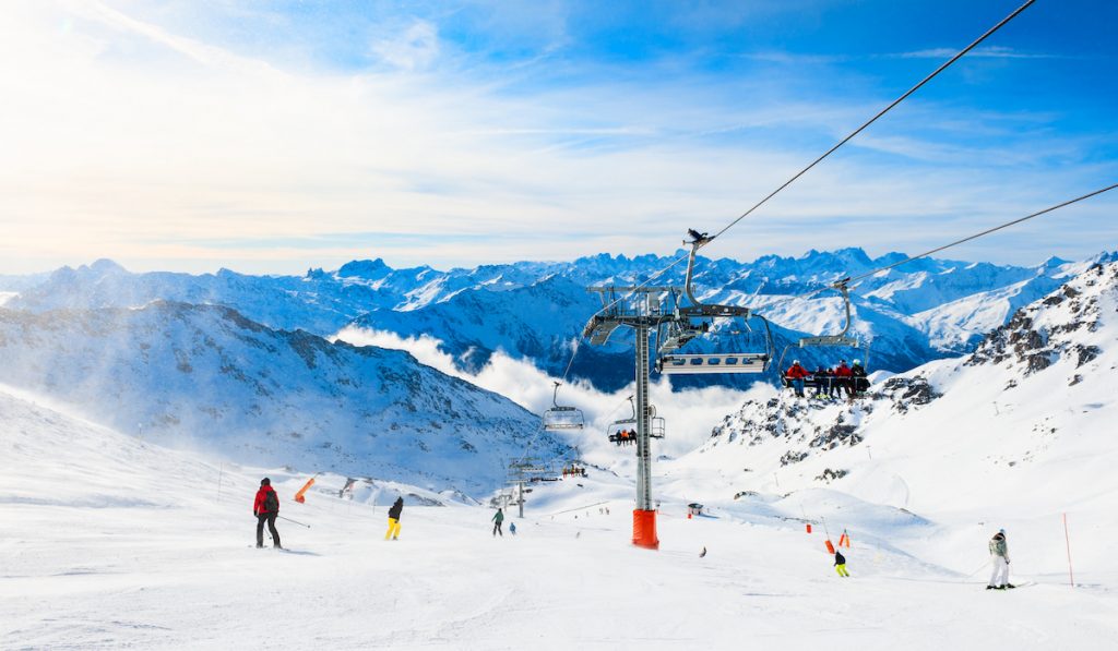 people enjoying skiing at a ski resort