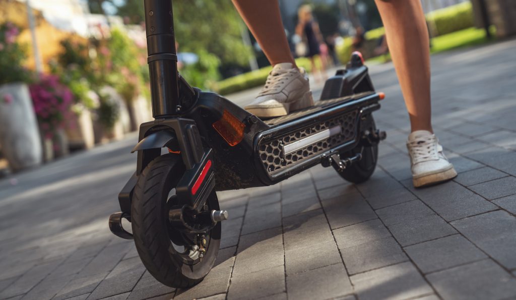 walking with an electric scooter