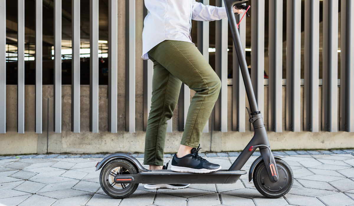 woman riding an electric scooter