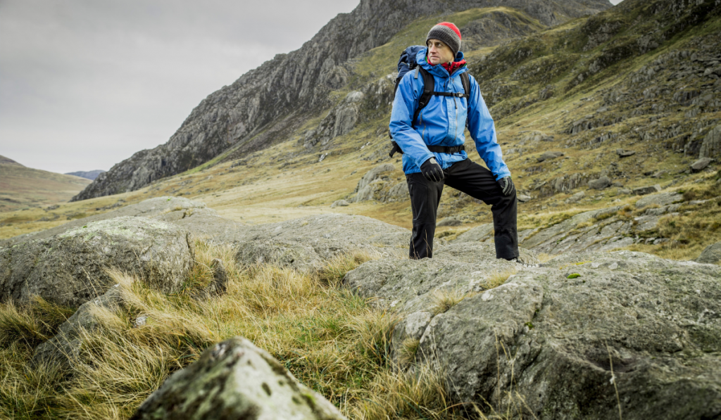 Man hiking in rocky landscape
